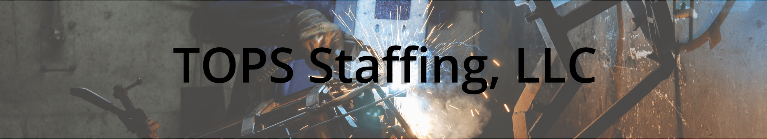 TOPS Staffing, LLC Header - Image of a Light Industrial Welder with the words TOPS Staffing, LLC overlaid on top.